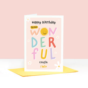 To our wonderful cousin birthday card. Colourful writing, flowers and smiley sun face on this personalised girls birthday card