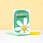 Load image into Gallery viewer, To the most wonderful Grandma, happy birthday. A cute and happy daisy greetings card with a green background can be personalised with Grandma&#39;s favourite name.
